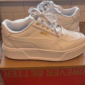 Puma White Sneakers with Gold Logo